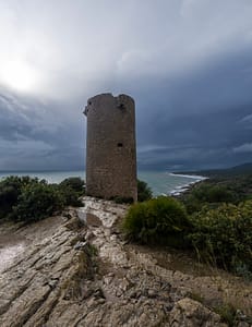 Medieval tower of Torre Badum overlooking the sea in the Irta natural park